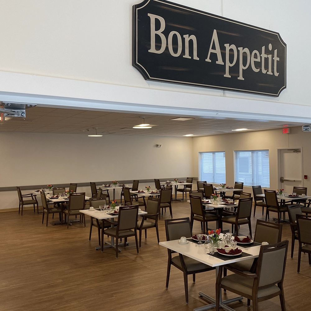 Photo of the dining room entrance with a sign that reads "Bon Appetit"